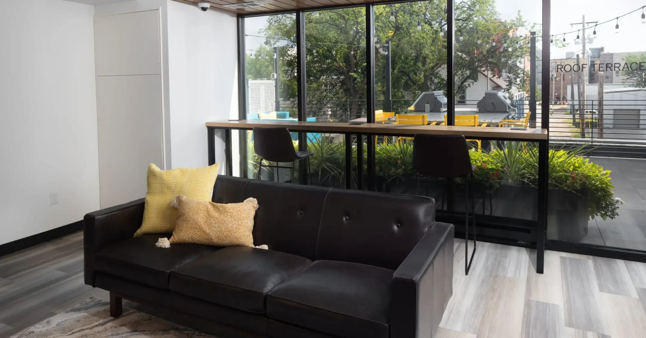 a couch in a room with windows.